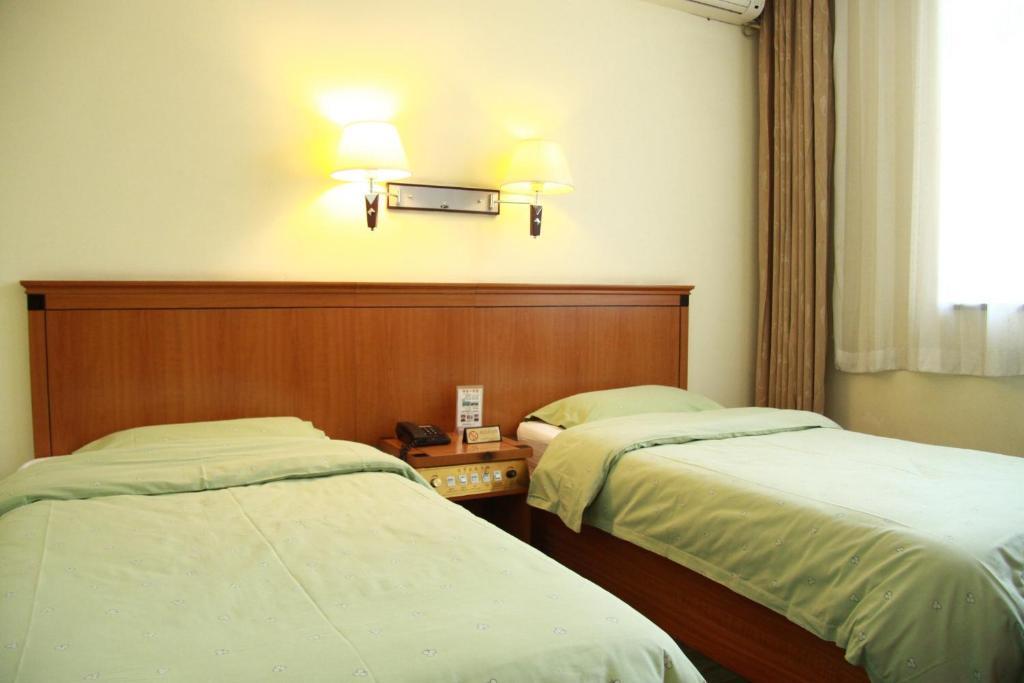 Beijing Fuxing Holiday Hotel Quarto foto