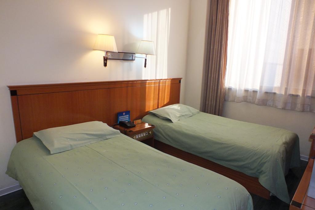 Beijing Fuxing Holiday Hotel Quarto foto