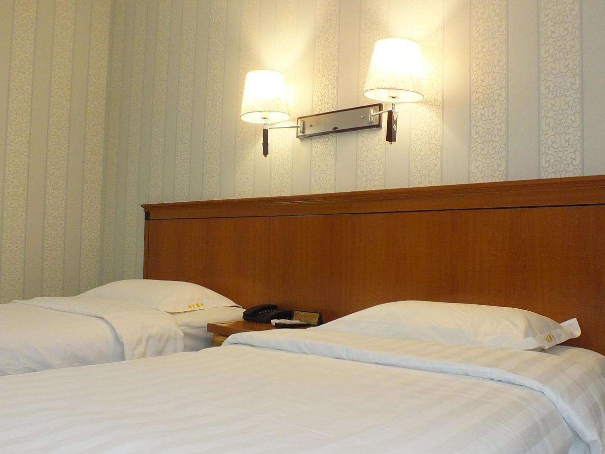 Beijing Fuxing Holiday Hotel Quarto foto