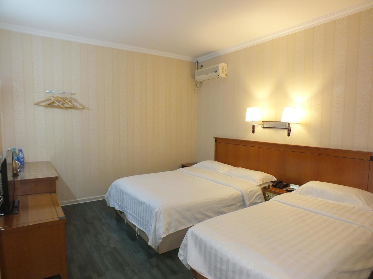 Beijing Fuxing Holiday Hotel Quarto foto