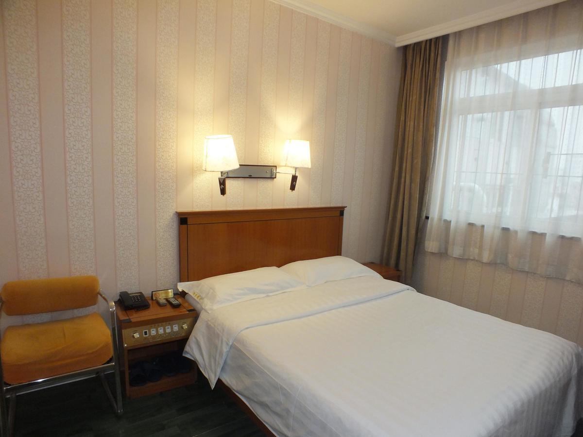 Beijing Fuxing Holiday Hotel Quarto foto